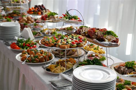 Catering service. Restaurant table with food at event. - Reventals Event Rentals