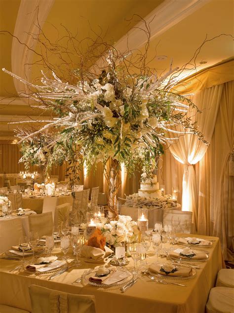 Tall Winter Wedding Flower Arrangement | Photography: Jay Lawrence Goldman Photography. Read ...