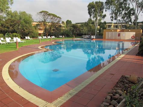 Pool at Sails in the Desert | Ayers Rock Resort. Very early … | Flickr