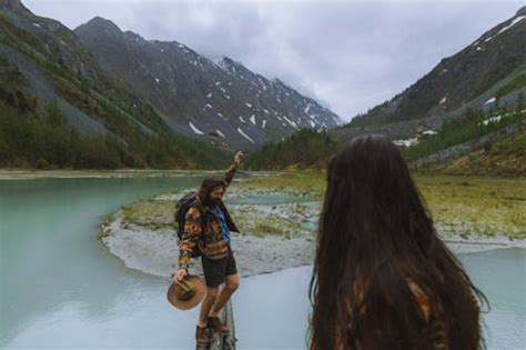 Happy Woman Hiking in Mountains · Free Stock Photo