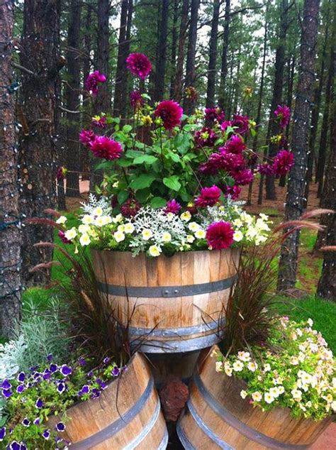 16 Easy To Make Affordable Wine Barrel Planters