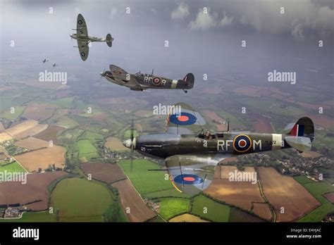 Photographic depiction of three pilots with 303 Squadron (Polish) RAF in Mk Vb Spitfires on a ...