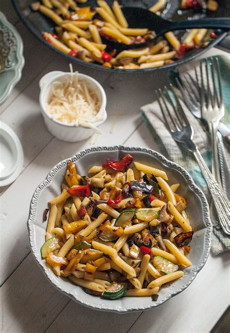 "Pasta With Mixed Vegetables" by Stocksy Contributor "Davide Illini" - Stocksy