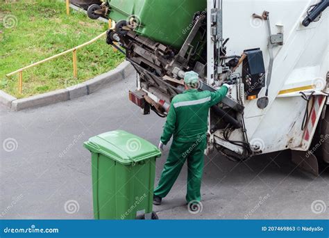 Garbage Collector Loads Garbage Truck with Household Waste from Garbage ...