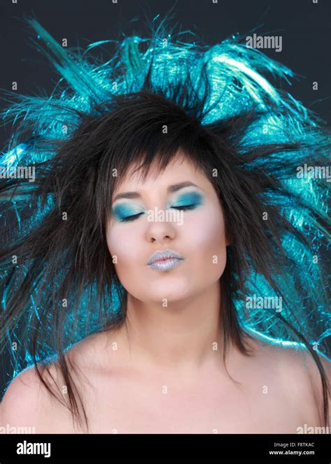 girl with blue electric hair Stock Photo - Alamy