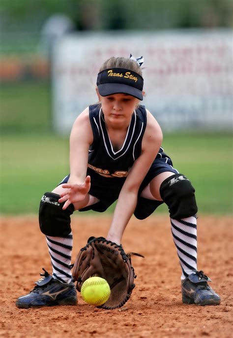 Softball Player About to Catch the Ball · Free Stock Photo