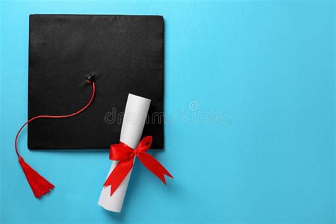 Graduation Hat and Diploma on Light Blue Background, Flat Lay. Space ...