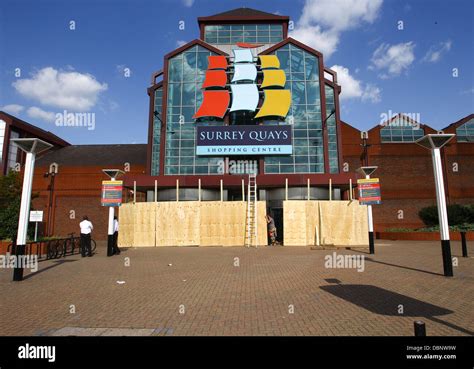 Surrey Quays shopping centre is boarded up in the aftermath of the London riots London, England ...