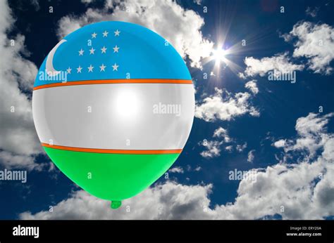 balloon in colors of uzbekistan flag flying on blue sky Stock Photo - Alamy