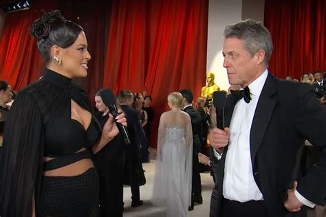 See Hugh Grant's Oscars 2023 red carpet interview with Ashley Graham