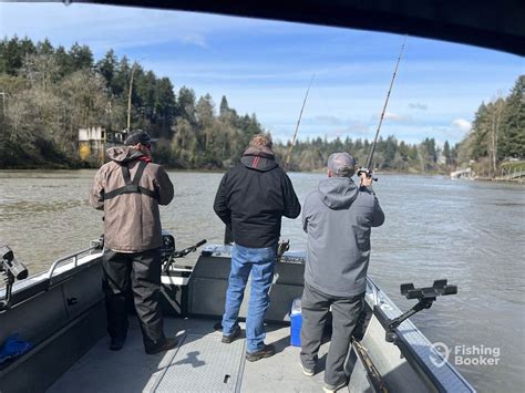 a view from behind of three anglers casting their line off the deck of ...