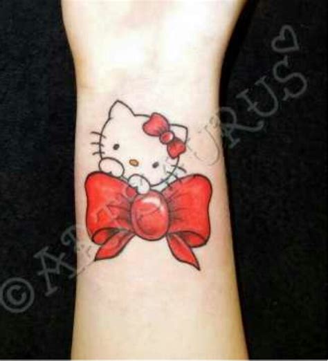 Hello Kitty on Bow tattoo | Tattoo