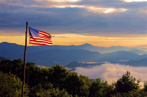 American flag flying over the Great Smoky Mountains in N… | Blue Ridge Mountains of North ...