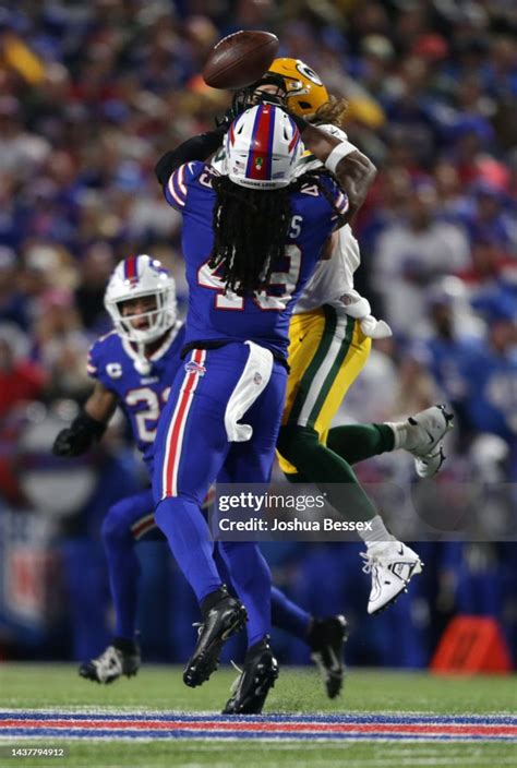 Tremaine Edmunds of the Buffalo Bills breaks up a pass to Robert ...