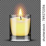 Photo of Burning Christmas candle in a glass jar | Free christmas images