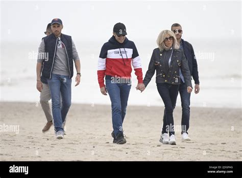 French President Emmanuel Macron and wife Brigitte Macron walking on ...