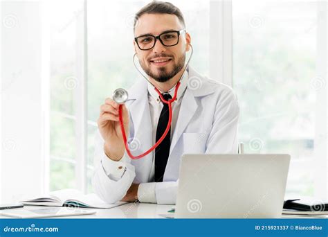 Doctor Showing Stethoscope at Office in Hospital. Stock Image - Image ...