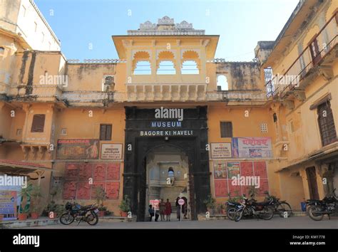 People visit Museum Bagore Ki Haveli in Udaipur India. Museum Bagore Ki Haveli is one of the ...