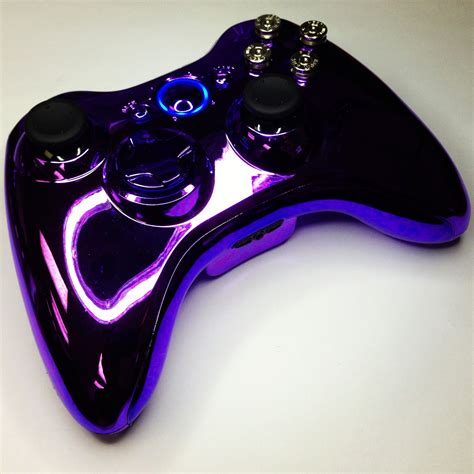 A purple chrome custom modded Xbox 360 controller with nickel bullet ...