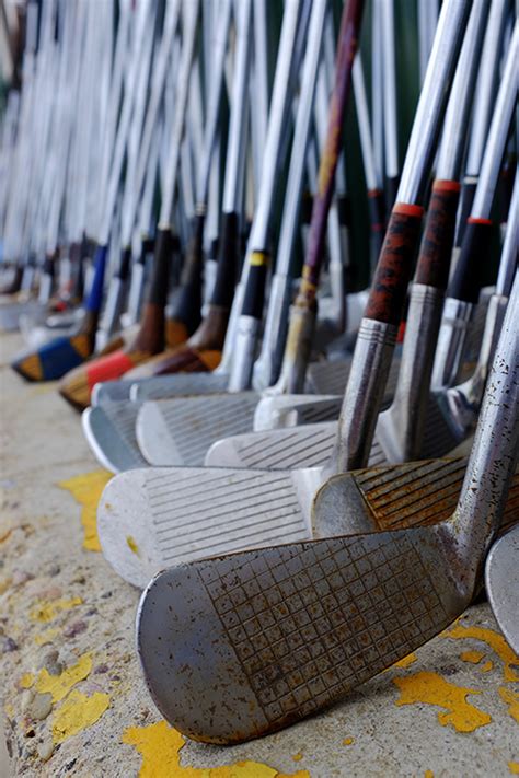 Row of Many Old Used Golf Clubs for Sport - SuperClean