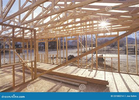 Wood Frame Of House Under Construction Stock Photo - Image: 23180214