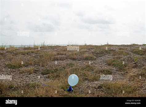 Balloon on beach Stock Photo - Alamy