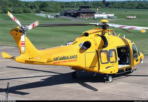 One of three Air Ambulance helicopters on site today (G-KSSC / G-KSSA also present).. G-LNAC ...