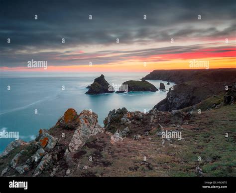 Kynance Cove sunset from the cliff top Stock Photo - Alamy