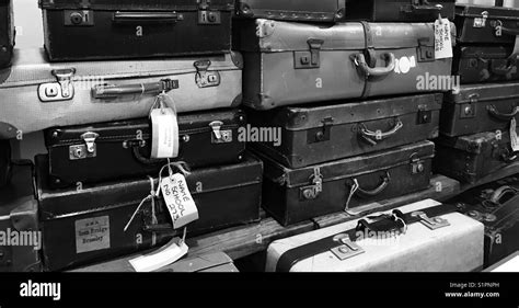 Vintage suitcases on the station Stock Photo - Alamy