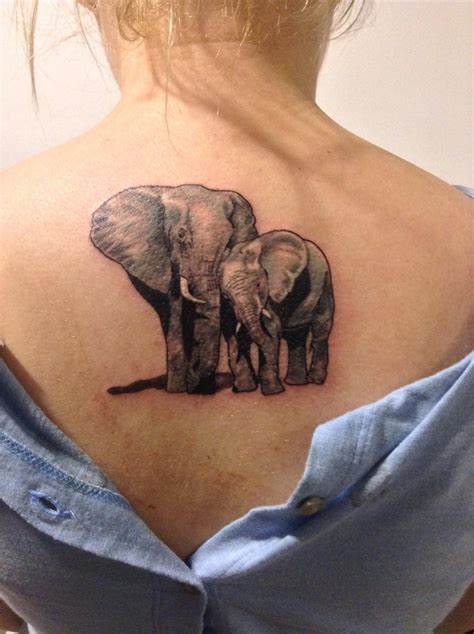 Love this but with two babies, one on each side | Elephant tattoos ...