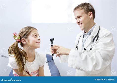 Girl Getting A Checkup At The Doctor's Office Stock Photo - Image: 38679670