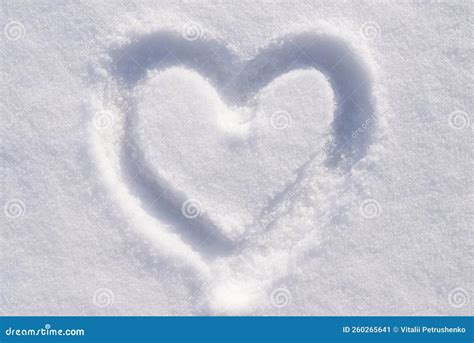 Heart shape on the snow stock image. Image of season - 260265641