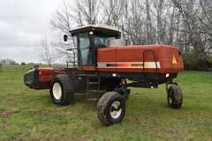 2000 Hesston 8250 Swather - Musser Bros Inc