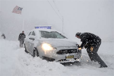 Photos: Nor'easter cuts power to over 1 million, unleashes over 2 feet of snow for some ...