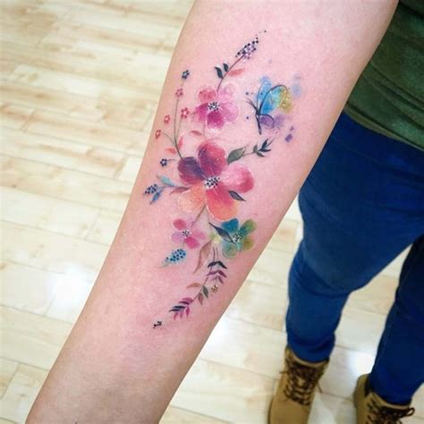 Feminine Colorful Floral Tattoo on forearm – EntertainmentMesh