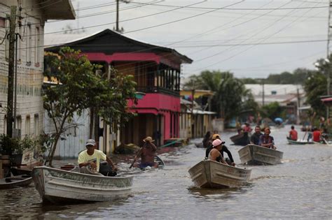 In pictures: Rising Amazon rivers flood Covid-hit areas in Brazil - BBC ...