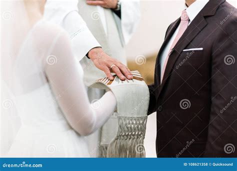 Priest Blessing Bride and Groom Stock Photo - Image of joined, happy: 108621358