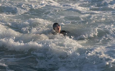 Hero lifeguards save swimmer as she slipped below waves ‘for the last time’