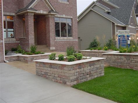 hardscape ideas for slopes | Hardscape, Brick planter, Front yard