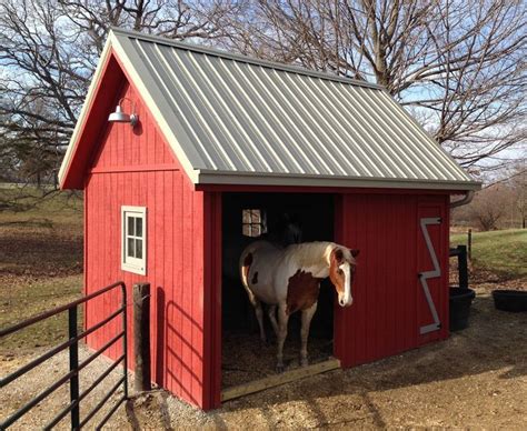 Now that is a run in shed! Room for 2 horses with rubber matting for ...