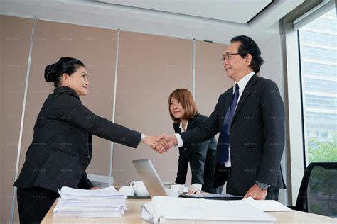 Business People Shaking Hands - Stock Photos | Motion Array