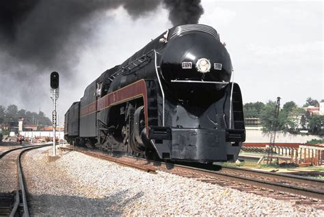 Southern Railway operated N&W J-class 4-8-4 Northern steam locomotive # 611, is departing the ...