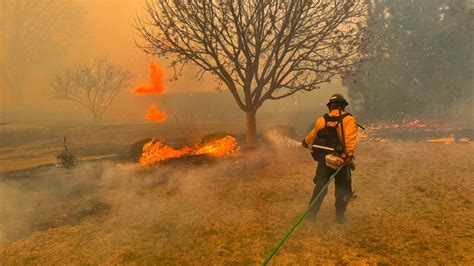 At least 2 dead as largest wildfire in state history tears through ...