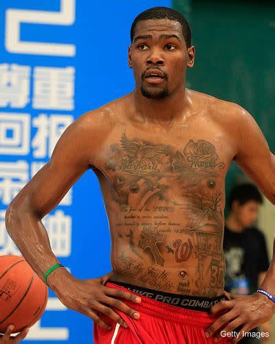 Kevin Durant has a lot of tattoos under his jersey