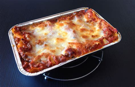 Lasagna al forno con mozzarella - prosciutto cotto - Golosi Peccati