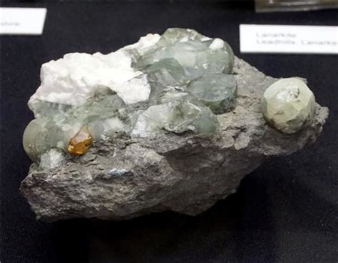 Greenockite on Prehnite and Natrolite - The Mineral and Gemstone Kingdom