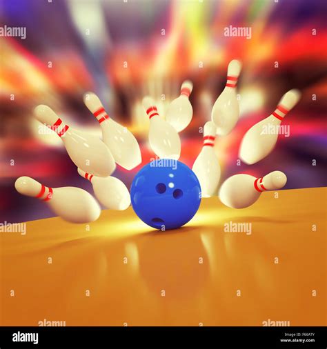 Scattered skittles and bowling ball Stock Photo - Alamy