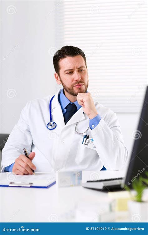 Pensive Male Doctor Watching Computer Monitor Stock Image - Image of medical, clinic: 87104919