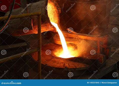 Molten Iron Pour from Ladle into Melting Furnace Stock Image - Image of energy, manual: 145531845