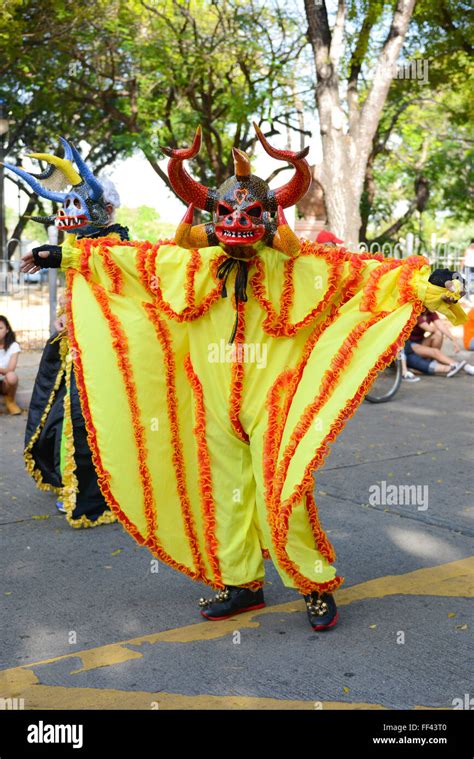 Traditional masked cultural figure VEJIGANTE during the carnival parade in Ponce. Puerto Rico ...